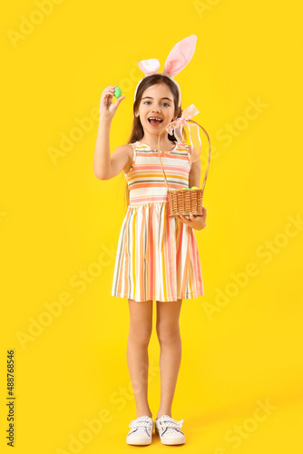 Cute little girl with bunny...