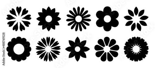Flower icons. Flower silhouettes. Symbol of floral design. Pattern of daisy, rose and chamomile. Set of cartoon simple graphic shape isolated on white background. Vector