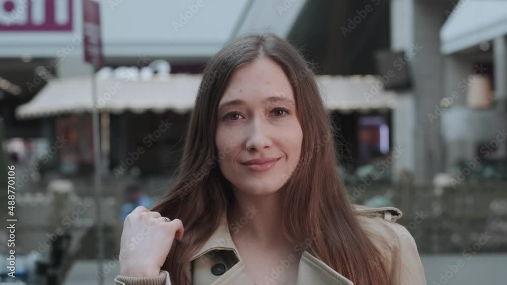 woman looking at camera and smiling woman looking at camera and smiling