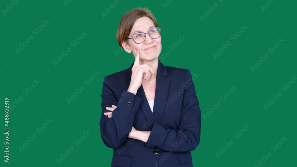 Woman standing and thinking an idea pointing the finger up over isolated background. Green screen chroma key Woman standing and thinking an idea pointing the finger up over isolated background. Green screen chroma key