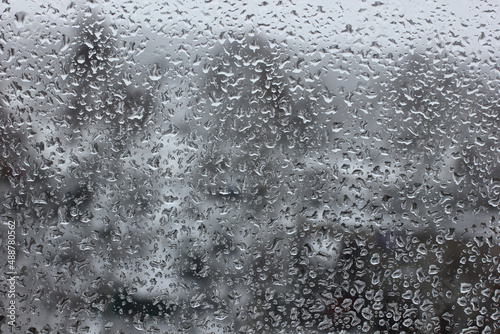 view of a window with textured raindrops