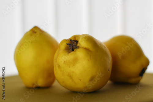 yellow quince on a table
