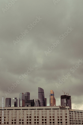 Moscow city, far away, in the foreground the old house of Moscow © Никита Рябкин