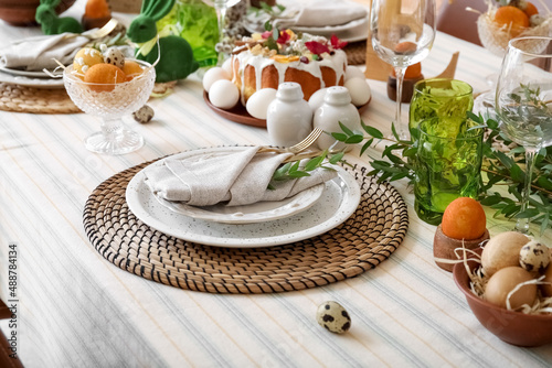 Canvas Print Plates and cutlery decorated with eucalyptus branch on dining table served for E