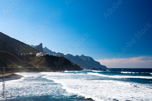 Panoramic view on lava rocks of laya de Almaciga and blue Atlantic ocean, Anaga national park near Tanagana village, North of Tenerife, Canary islands, Spain