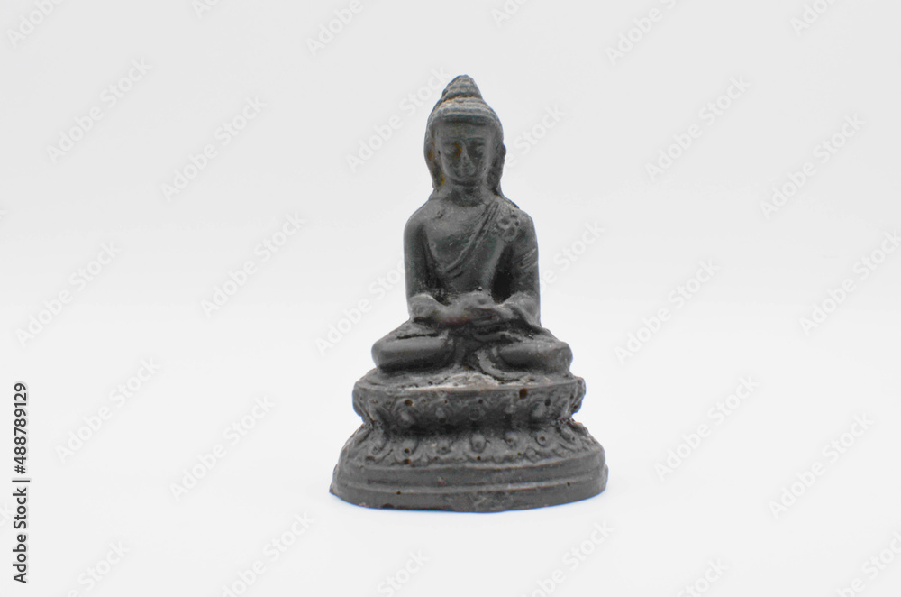 the Buddha.buddha statuette on a white background.meditation. yoga.