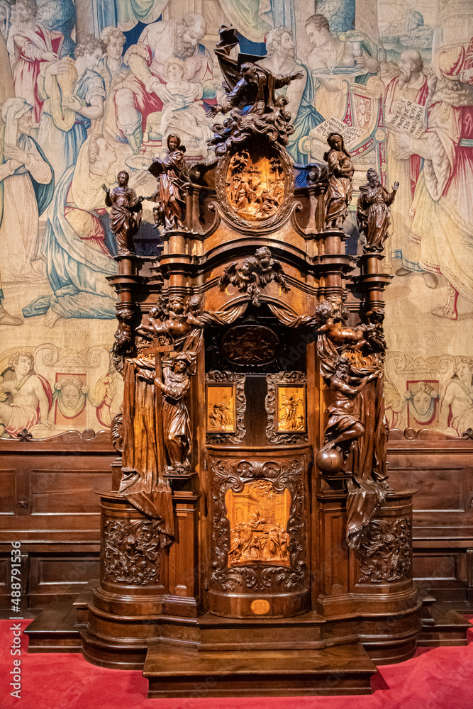 Fototapeta premium Wooden baroque confessional in the church of Basilica di Santa Maria Maggiore, in Upper Bergamo alta, Lombardy, Italy, Europe