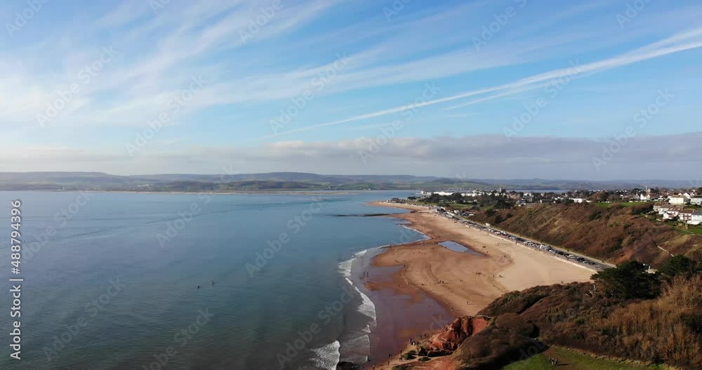 Aerial View Of Exmouth Beach Viewed From Orcombe Point On Clear Day. Pedestal Down Aerial View Of Exmouth Beach Viewed From Orcombe Point On Clear Day. Pedestal Down
