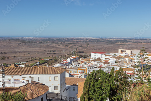 Medina Sidonia and its surroundings with Cadiz and the Atlantic Ocean on the horizon photo