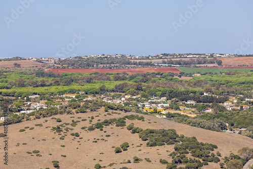 Colorful countryside around Vejer de la Frontera in the direction of Cadiz. The very distant objects are blurred due to the ascending heat