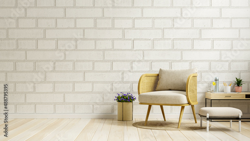 Living room interior room brick wall mockup in warm tones,gray armchair on wooden flooring.