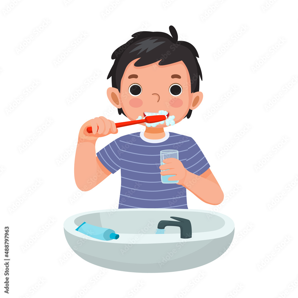 cute little boy brushing teeth with toothpaste holding a glass of water for cleaning daily routine hygiene activity cute little boy brushing teeth with toothpaste holding a glass of water for cleaning daily routine hygiene activity