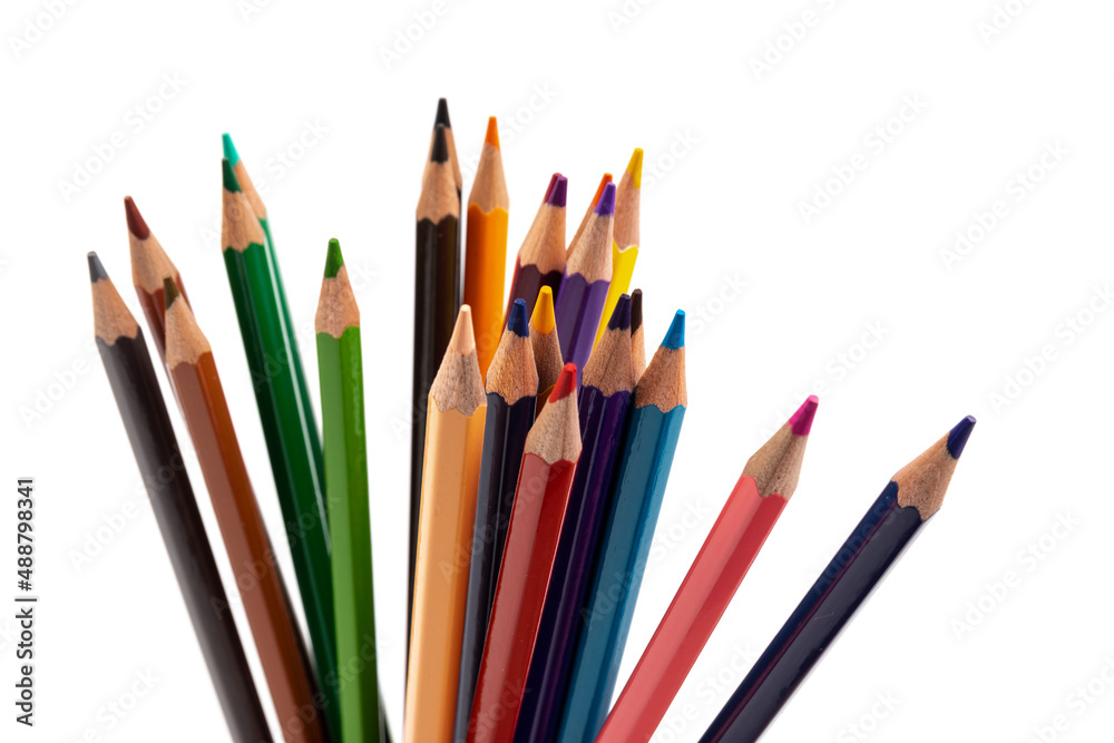 Many multicolored pencils, isolated on white background with copy space. Art and education background. Many multicolored pencils, isolated on white background with copy space. Art and education background.