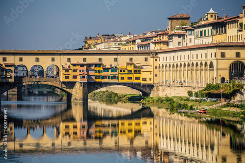 view of bridge Ponte Vecchio in Florence, old stone bridge, photo taken from Michelangelo Square, Italy