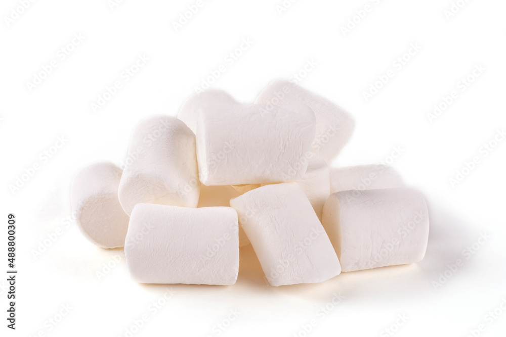 A handful (pile) of sweet marshmallows on a white isolated background. A handful (pile) of sweet marshmallows on a white isolated background.