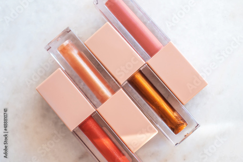 Four shades of trendy bronze lip gloss
