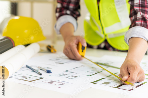 Engineers are designing houses for architectural projects. engineering tools at work Architects calculate and draft building construction drawings, civil engineering, architect concepts.