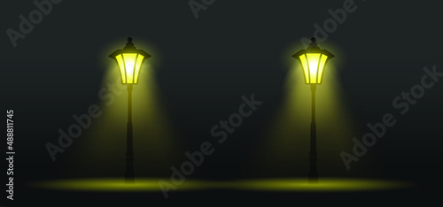 Cartoon old and classic street lamp or City street lantern. Yellow street light. Evening, dark silhouette lamppost lights