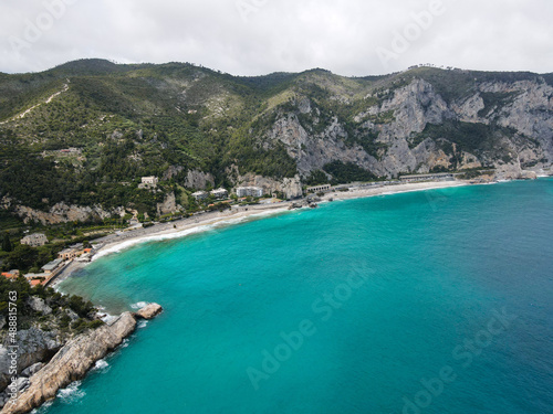 Aerial view of Aurelia street in Noli, Capo Noli and Varigotti, province of Savona. Drone photography from above of snake street snake in Liguria, north Italy, near Punta Crena and Spotorno. © AerialDronePics
