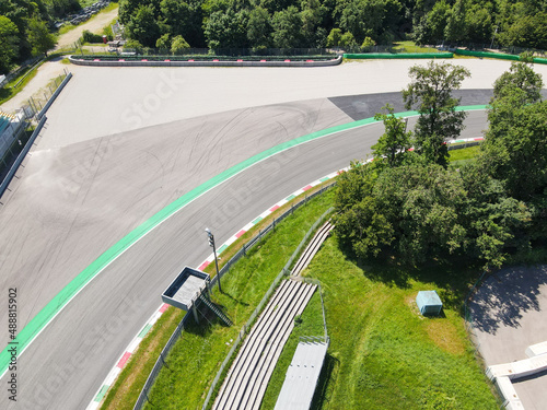 Fototapeta Naklejka Na Ścianę i Meble -  Aerial View of Autodromo Nazionale Monza, that is a race track near the city of Monza in Italy, north of Milan. Venue of the Formula 1 Grand Prix. Epic drone shot in autumn.