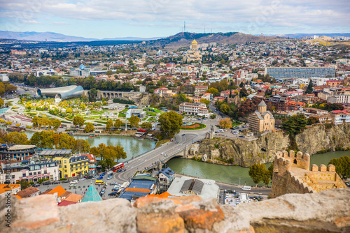 Fototapeta Naklejka Na Ścianę i Meble -  Aerial view of Old Tbilisi from Narikala Fortes. Sunny day in Tbilisi, Georgia