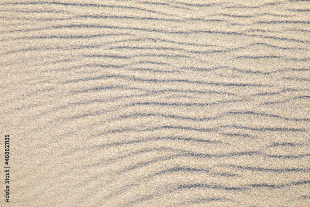 background of sandy beach with soft waves background of sandy beach with soft waves