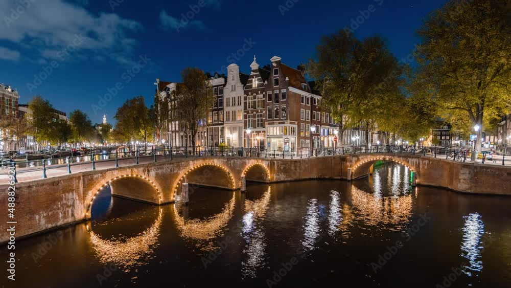Night Time Lapse with clouds and boats in Amsterdam, The Netherlands