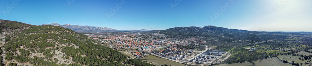 Panoramic view of the village of moralzarzal, surrounded by pine forests, located in the northwestern mountains, in the city of Madrid.