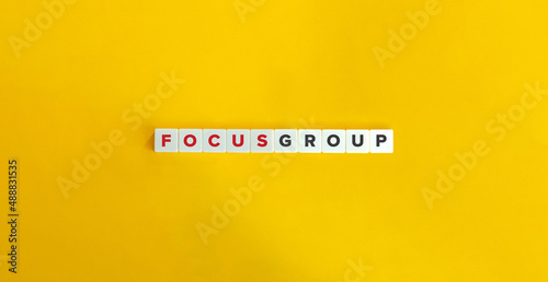Focus Group Banner. Letter Tiles on Yellow Background. Minimal Aesthetics.