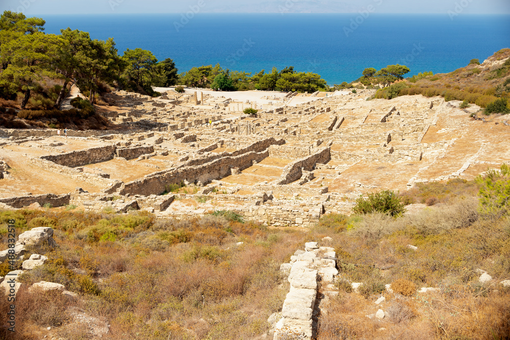 Ruins of Hellenistic houses and doric temple in ancient Kamiros archeological site Rhodes Greece Ruins of Hellenistic houses and doric temple in ancient Kamiros archeological site Rhodes Greece