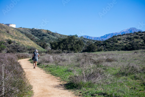 A Beautiful, Healthy and Mature Woman Hiking on a California Chaparral Trail  © Gary Peplow
