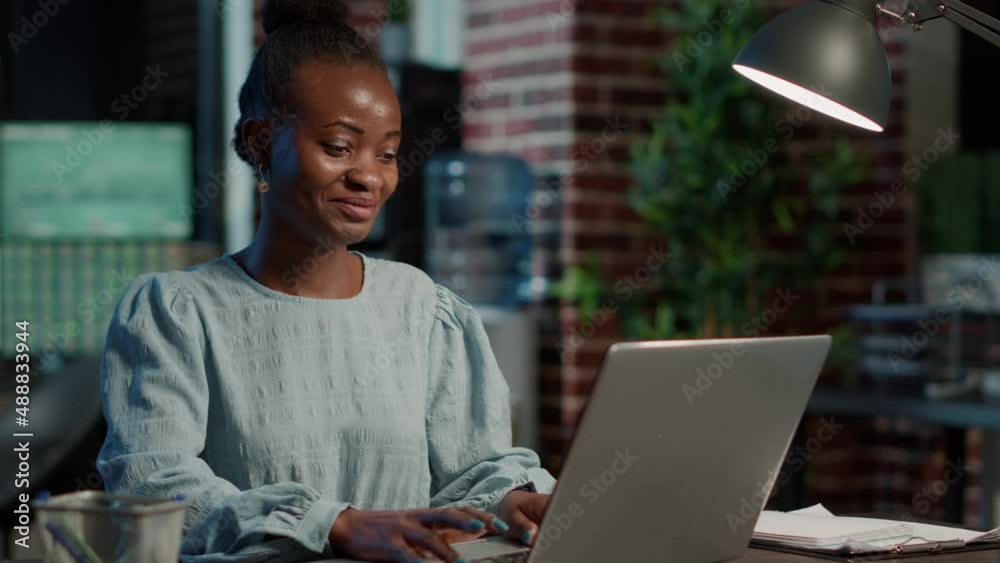 Portrait of sales assistant working on laptop to create capital profit, monitoring real time stocks and statistics. Financial investment and money banking trade with forex exchange.