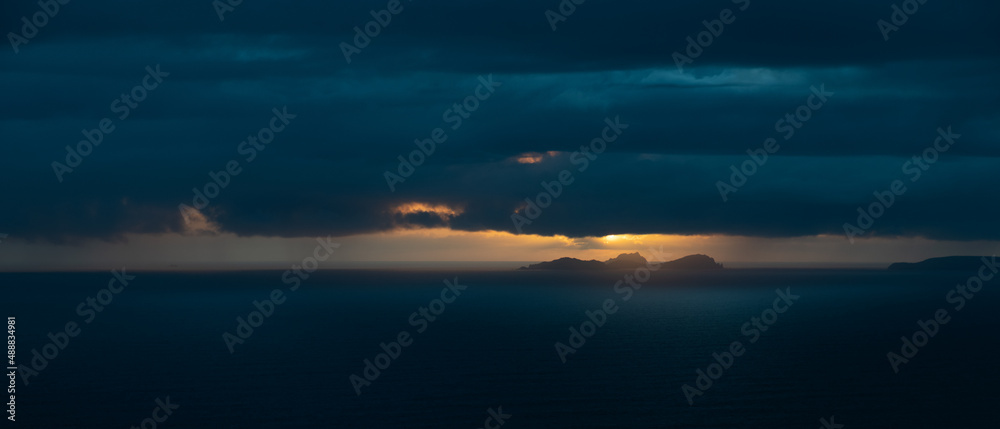 Spectacular sunny and cloudy sunset seen from Valentia Island Ring of Kerry Ireland