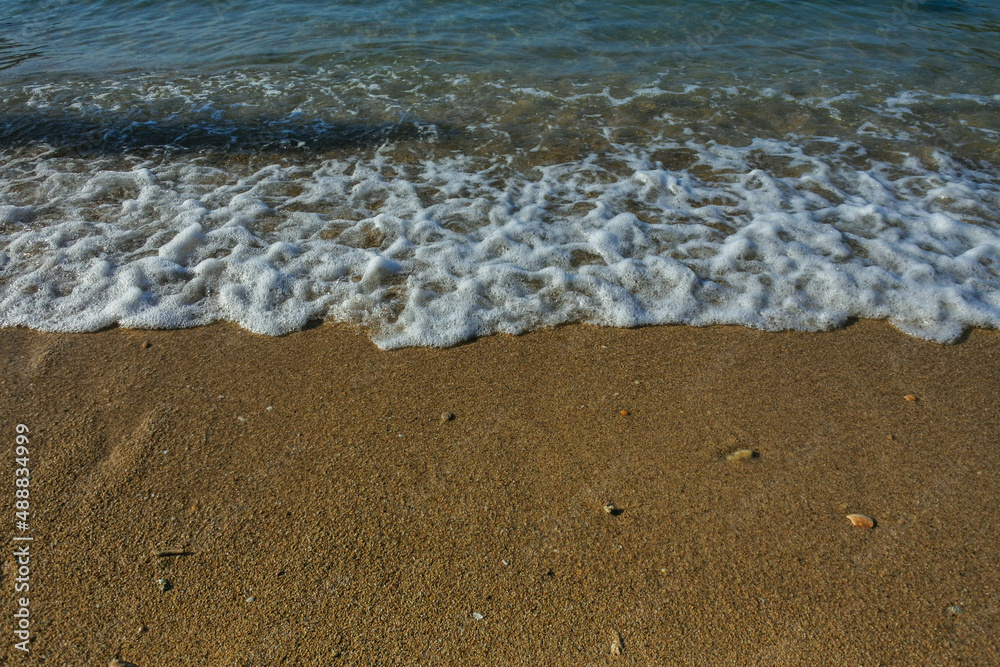 gentle waves on the coast of a beach in Indonesia gentle waves on the coast of a beach in Indonesia