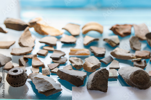 Clay shards or fragments old retro vintage antique medieval archaeological finds. Background with copy space