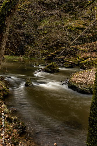 blurred water in the Kamnitz river in the Gorges of the Kamenice River