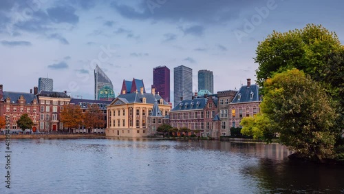 Day to Night Time Lapse from Den Haag with clouds and Binnenhof at sunset, Zuid-Holland, The Netherlands photo