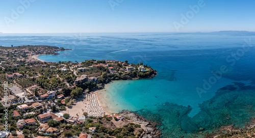 Greece Peloponnese. Stoupa seaside village and sandy beach, aerial view. Mani, Messenia