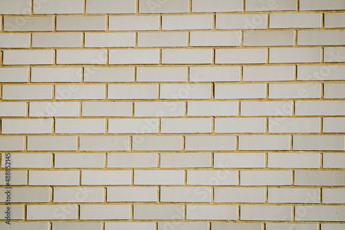 An off-white brick wall on the side of a gas station in Orwell  Ohio
