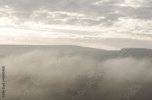 Autumn mist shrouds Chapel Fell, a mountain in the North Pennines, Weardale, County Durham