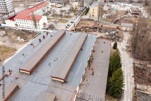 The roof of the old industrial plant building in Kiev. Aerial drone view.