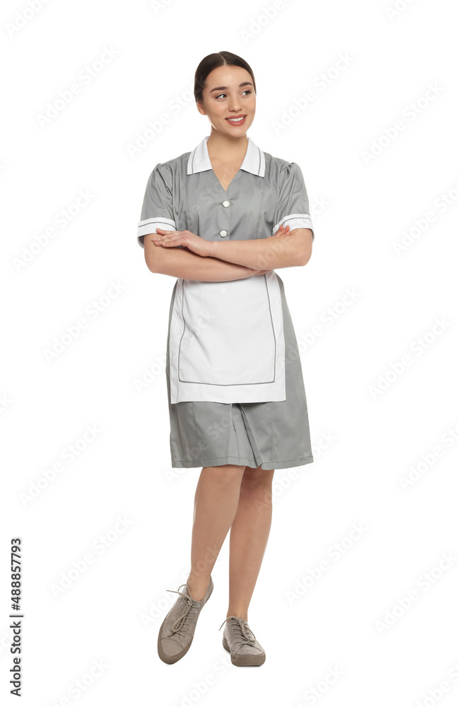 Full length portrait of young chambermaid in tidy uniform on white background Full length portrait of young chambermaid in tidy uniform on white background