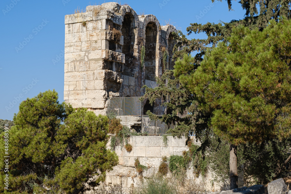 Left view of a fragment of a grandiose structure - an ancient open-air theater Odeon of Herodes Atticus, Athens, Greece