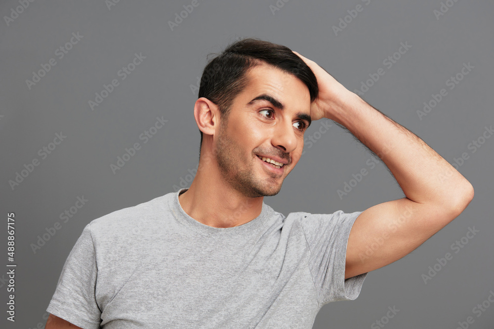portrait man casual wear gray t-shirt fun hand gesture isolated background portrait man casual wear gray t-shirt fun hand gesture isolated background