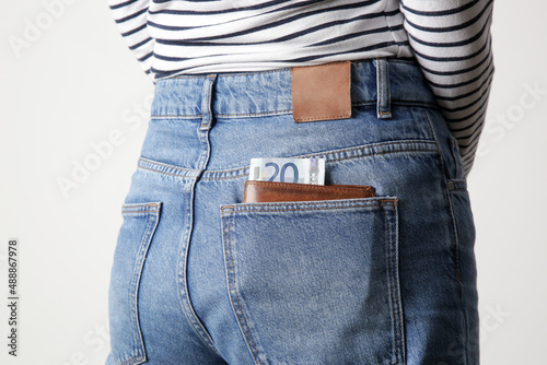Woman with 20 euros in her pocket