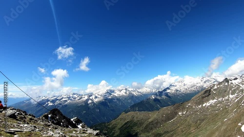 Panoramic view from the summit of mount Reitereck in Carinthia, Maltatal in the Austrian Alps, Central Eastern Alps. Endless snow capped high mountain chains in the High Tauern. Outdoor activity.
 photo