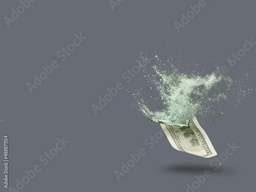 Plakat Inflation, hyperinflation, dollar stagflation. Dollar bill sprayed on a background.
