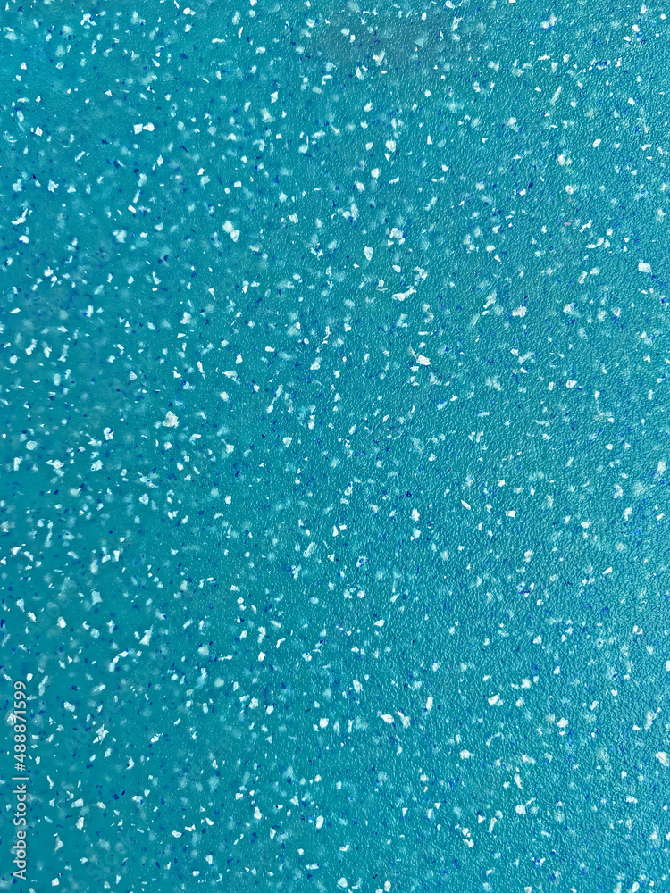 close up of aqua plastic board with crumbs pattern close up of aqua plastic board with crumbs pattern
