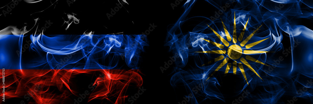 Donetsk People's Republic vs Greece, Greek Macedonia flag. Smoke flags placed side by side isolated on black background.
