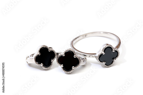 Tableau sur toile ring and earrings with black enamel isolated on white background- Image